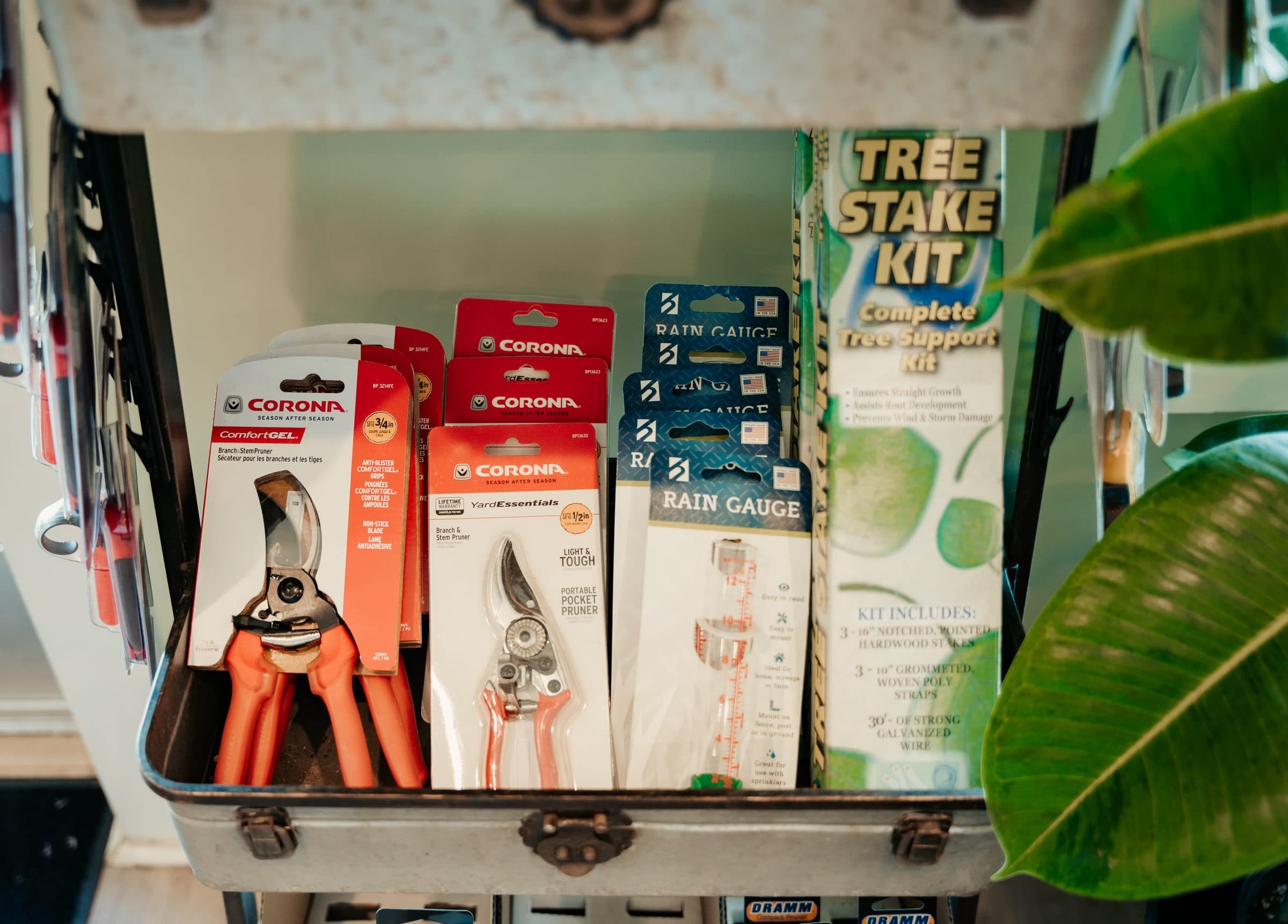 Tree stake kits and rain gauges