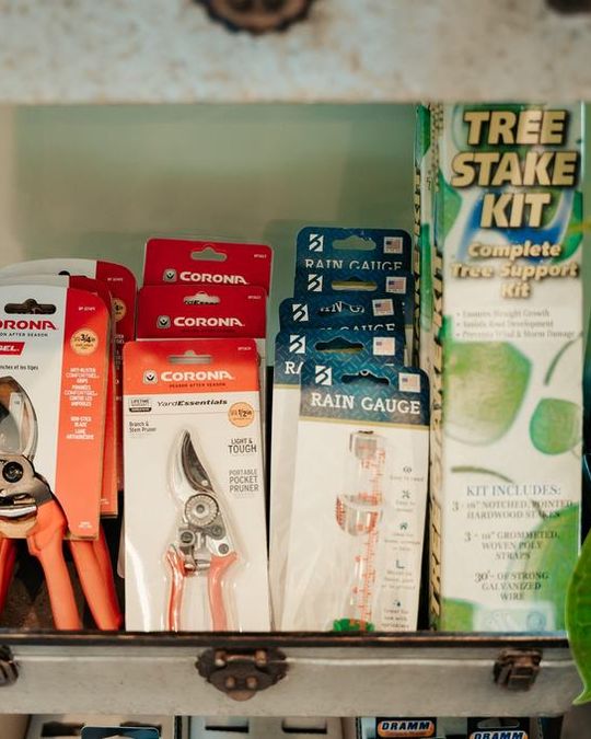Tree stake kits and rain gauges